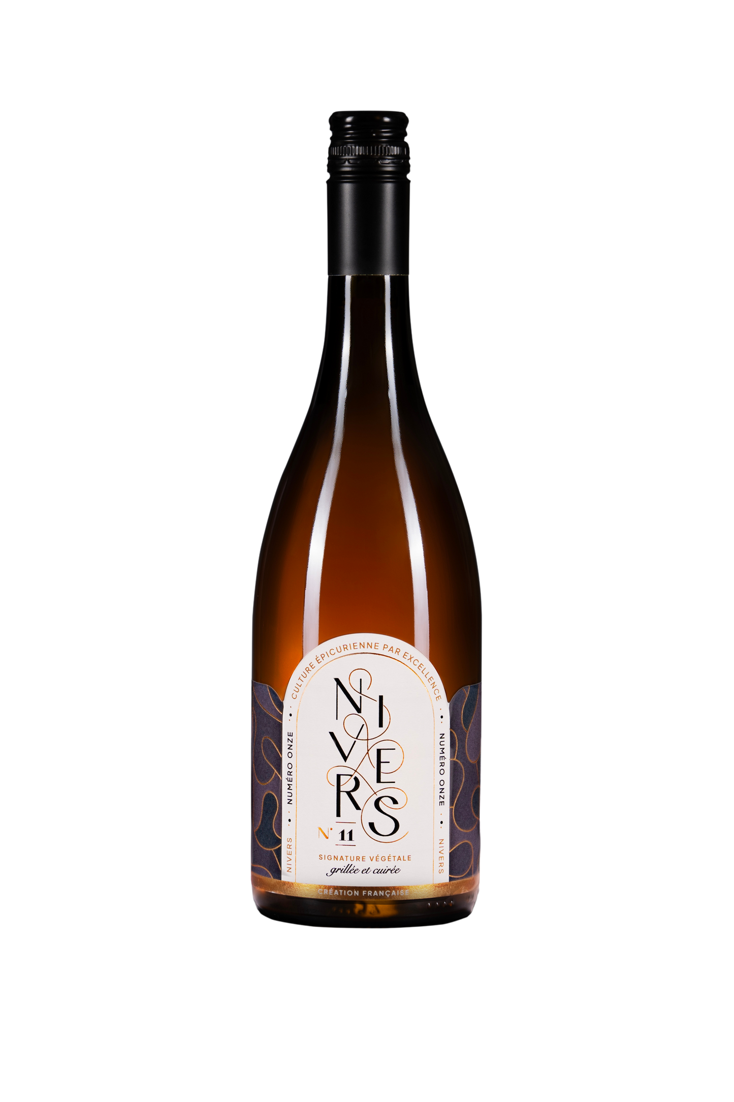 A bottle of Nieves No. 11  non-alcoholic cuvée of Grand Cru black tea, Japanese green tea, French Verjus, and Osmanthus flower. featuring an 750mL amber-brown glass bottle with a cream-colored label and a black screw cap, set against a plain white background.
