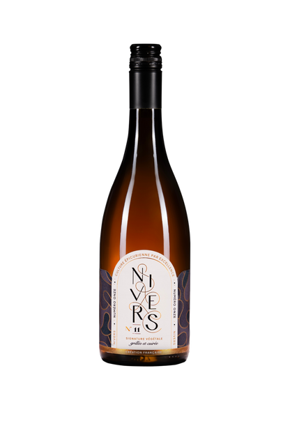 A bottle of Nieves No. 11  non-alcoholic cuvée of Grand Cru black tea, Japanese green tea, French Verjus, and Osmanthus flower. featuring an 750mL amber-brown glass bottle with a cream-colored label and a black screw cap, set against a plain white background.