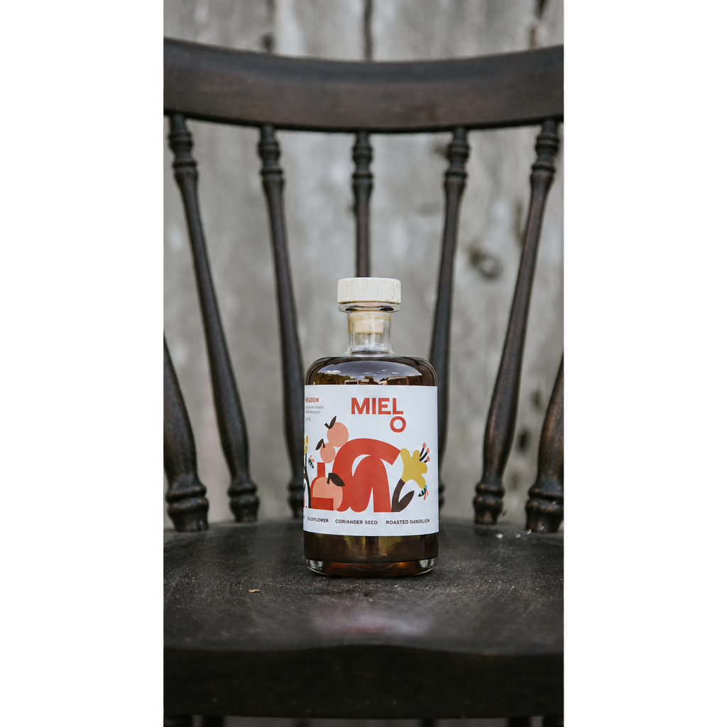 Mielo bottle on chair with transparent side padding
