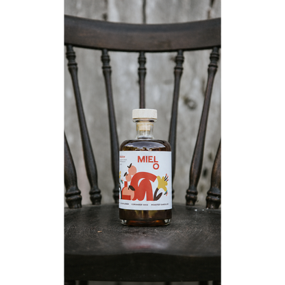 Mielo bottle on chair with transparent side padding